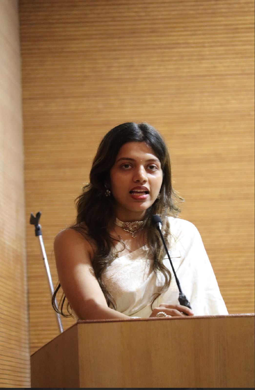 Rhea Khanolkar at the podium
